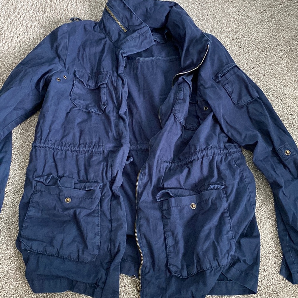 Navy jacket with irreversible hood